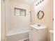 Bathroom featuring a tub/shower combo, vanity, and classic fixtures at 5317 Holmby Ave, Las Vegas, NV 89146