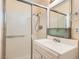 Bathroom featuring a shower with sliding glass doors and a modern vanity at 5317 Holmby Ave, Las Vegas, NV 89146