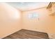 Bedroom with a window and wood-look flooring at 5317 Holmby Ave, Las Vegas, NV 89146