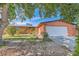 Charming single-story home with a well-maintained front yard and an attached two-car garage at 5317 Holmby Ave, Las Vegas, NV 89146