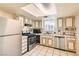 Traditional kitchen with stainless steel appliances and white cabinetry at 5317 Holmby Ave, Las Vegas, NV 89146