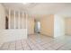 Living room featuring tile floors and a decorative partition at 5317 Holmby Ave, Las Vegas, NV 89146