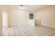 Living room with tile floors and an archway to another area at 5317 Holmby Ave, Las Vegas, NV 89146