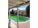 Outdoor inground pool and covered patio offer the perfect space for relaxation and entertainment at 5317 Holmby Ave, Las Vegas, NV 89146