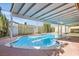 An inviting backyard pool with patio offers a relaxing outdoor experience at 5317 Holmby Ave, Las Vegas, NV 89146