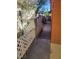 Side yard featuring lattice fencing and potential garden space, offers a unique outdoor experience at 5317 Holmby Ave, Las Vegas, NV 89146