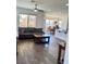 Open-concept living room flows seamlessly into dining area, great for Gathering gatherings at 5466 Scotch Cap Dr, Las Vegas, NV 89122