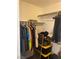 Functional walk-in closet featuring hanging rods, shelves, and storage bins at 5466 Scotch Cap Dr, Las Vegas, NV 89122