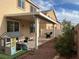 Backyard features patio area, BBQ, outdoor playset and easy care landscaping at 5653 Nobleton Ct, North Las Vegas, NV 89081