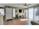 Open living space with hardwood floors, large sliding doors and an inviting atmosphere at 5710 E Tropicana Ave # 2218, Las Vegas, NV 89122
