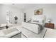 Bright bedroom with white furniture, a patterned rug, and modern decor provides a luxurious feel at 60 Pecos St, Las Vegas, NV 89110