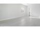 Bright bedroom with wood floors and natural light, leading to a connected bathroom at 60 Pecos St, Las Vegas, NV 89110