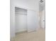 Bedroom closet featuring sliding doors and shelving with light colored wood floors at 60 Pecos St, Las Vegas, NV 89110