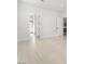 Well-lit bedroom with wood floors and access to other rooms in the house at 60 Pecos St, Las Vegas, NV 89110