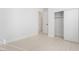 This bedroom includes an closet, neutral paint, and wood-look floors at 60 Pecos St, Las Vegas, NV 89110