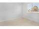 Bright bedroom featuring wood-look floors and a window providing natural light at 60 Pecos St, Las Vegas, NV 89110
