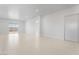 Bright and airy living space with wood floors and sliding glass doors that provide seamless indoor-outdoor living at 60 Pecos St, Las Vegas, NV 89110