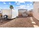 Gravel backyard features storage shed and trailer at 623 Blue Snow River Ct, Henderson, NV 89002