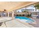 Backyard featuring a swimming pool, gazebo with a hot tub, and a covered patio at 623 Blue Snow River Ct, Henderson, NV 89002