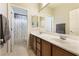 Bright bathroom boasts a double vanity with ample counter space and a shower/tub combo at 623 Blue Snow River Ct, Henderson, NV 89002
