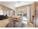 The dining area sits adjacent to the kitchen and has sliding doors to the backyard pool at 623 Blue Snow River Ct, Henderson, NV 89002