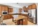 Well-equipped kitchen with granite countertops, stainless steel appliances, and ample cabinet space at 623 Blue Snow River Ct, Henderson, NV 89002