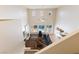 The living room showcases high ceilings, a fireplace, and views of the backyard pool at 623 Blue Snow River Ct, Henderson, NV 89002