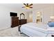 The main bedroom suite features neutral decor and a view into the ensuite bathroom at 623 Blue Snow River Ct, Henderson, NV 89002