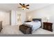 The main bedroom features an ensuite bathroom and neutral decor at 623 Blue Snow River Ct, Henderson, NV 89002