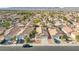 An aerial view of a residential neighborhood with tree-lined streets and well-maintained houses at 628 Carlos Julio Ave, North Las Vegas, NV 89031