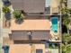 Aerial view showcasing the backyard pool and the surrounding neighborhood at 628 Carlos Julio Ave, North Las Vegas, NV 89031