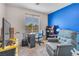 Functional bedroom space featuring a desk area and ample natural light, ideal for work or study at 628 Carlos Julio Ave, North Las Vegas, NV 89031