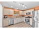 Updated kitchen features stainless steel appliances and lots of counter and cabinet space at 628 Carlos Julio Ave, North Las Vegas, NV 89031