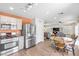 The home offers an open-concept kitchen with granite countertops and stainless steel appliances at 628 Carlos Julio Ave, North Las Vegas, NV 89031