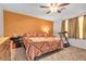 The main bedroom features carpet, an accent wall, and space for a treadmill and desk at 628 Carlos Julio Ave, North Las Vegas, NV 89031