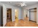 Spacious bedroom with ensuite bathroom, closet, and laminate flooring at 6540 Angel Mountain Ave, Las Vegas, NV 89130