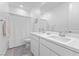 Bright bathroom with double sinks, and modern fixtures at 6557 Corsari Ridge St, Las Vegas, NV 89166