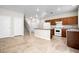 Functional kitchen with center island, modern appliances, and seamless access to dining area at 6743 Windingwood St, Las Vegas, NV 89148