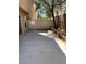 Private backyard features a patio, brick planter, and fence for added privacy at 7351 San Pablin St, Las Vegas, NV 89139