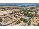 Aerial view of home with a pool, set amidst desert landscaping at 7760 Haven St, Las Vegas, NV 89123