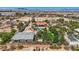 Aerial view of an estate featuring a lush lawn, pool, and detached garage at 7760 Haven St, Las Vegas, NV 89123