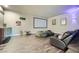 Inviting home theater with comfortable seating and projector screen for entertainment at 7760 Haven St, Las Vegas, NV 89123