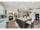 Stylish kitchen with granite island, stainless appliances, and modern cabinetry at 7760 Haven St, Las Vegas, NV 89123