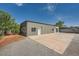 Outbuilding featuring neutral exterior with many windows and a door at 7760 Haven St, Las Vegas, NV 89123
