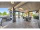 Large outdoor patio with a grill and outdoor seating area at 7760 Haven St, Las Vegas, NV 89123
