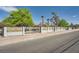 Street view of the property with a decorative fence and desert landscaping at 7760 Haven St, Las Vegas, NV 89123
