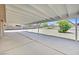 Large backyard featuring a covered patio, desert landscaping, and plenty of space at 7925 Placid St, Las Vegas, NV 89123