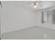 Bright bedroom showcasing neutral walls, a large window and light-colored flooring at 7925 Placid St, Las Vegas, NV 89123