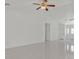Spacious living room featuring vaulted ceilings, tile floors, and an inviting atmosphere at 7925 Placid St, Las Vegas, NV 89123