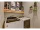 Laundry room featuring newer model, front load washer and dryer units at 7938 Jessamy St, North Las Vegas, NV 89084